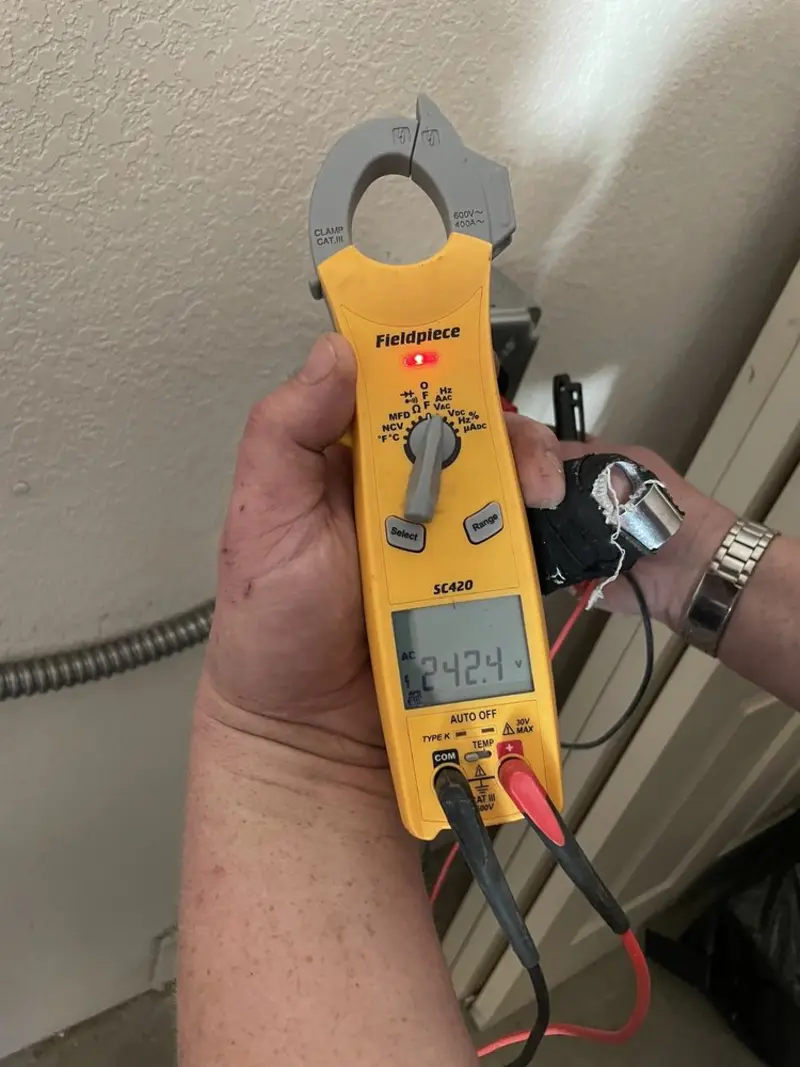 Voltage testing with clamp meter during Generator Installation in Little Falls